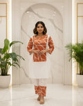 Women's White and Rust Orange Abstract Leaf Print Cotton Kurta with Matching Pants Set