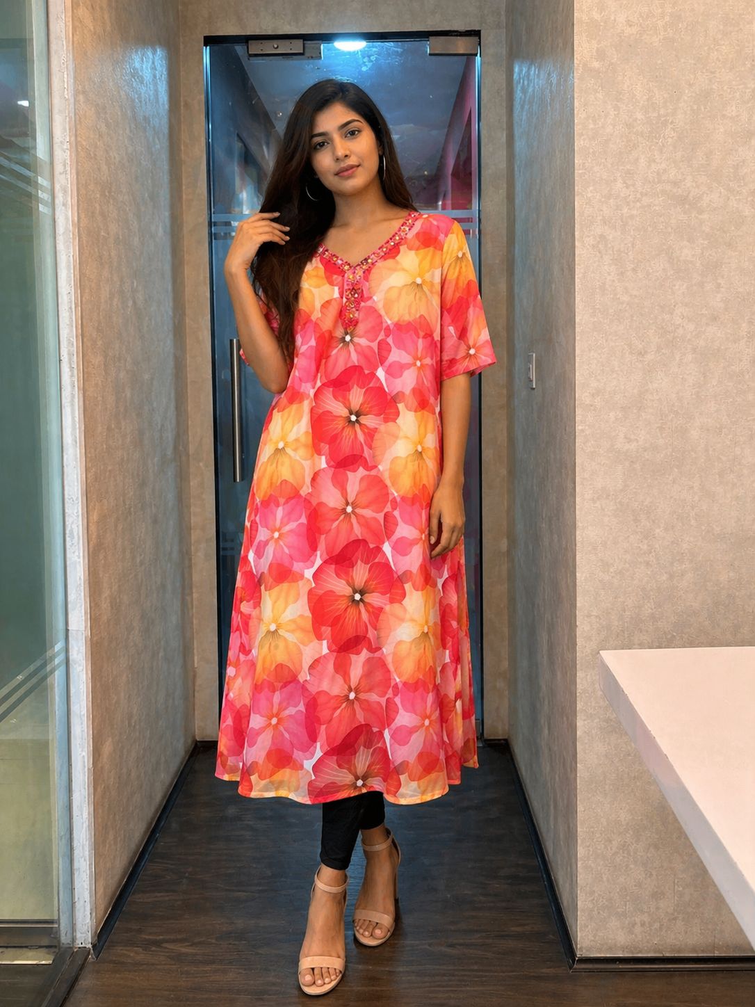 Women's Pink and Orange Floral Print Georgette Flared Kurta with V-Neck and Half Sleeves